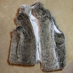 Reversible grey fur white microfiber vest